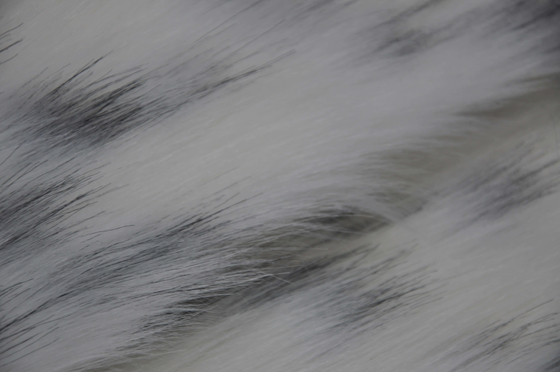 black spot on a white background Long Hair Fur Fabric，Long plush fabric: The perfect blend of comfort and fashion