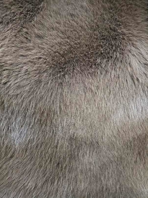 Coffee colored imitation fox fur is thick, solid, and soft